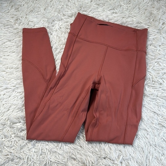 lululemon athletica Pants - Lululemon In Movement 7/8 Tight *Everlux 25" Red Bronzer